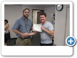 Andrew presenting Tim with his certificate for completion of the 8-week Peer Counseling class